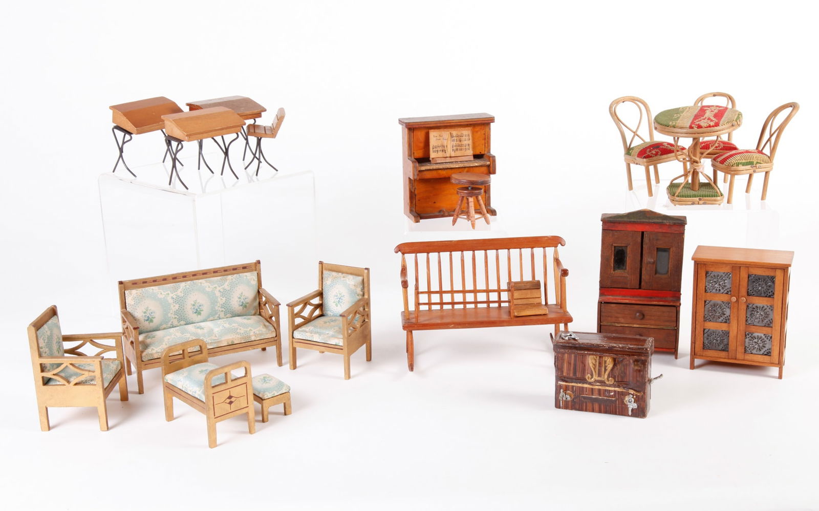 GROUP OF MISCELLANEOUS DOLL HOUSE FURNITURE: INCLUDING an upright piano, school desks, mammy bench, etc. Cupboard is 5 1/2 inches high. See pics for more info.