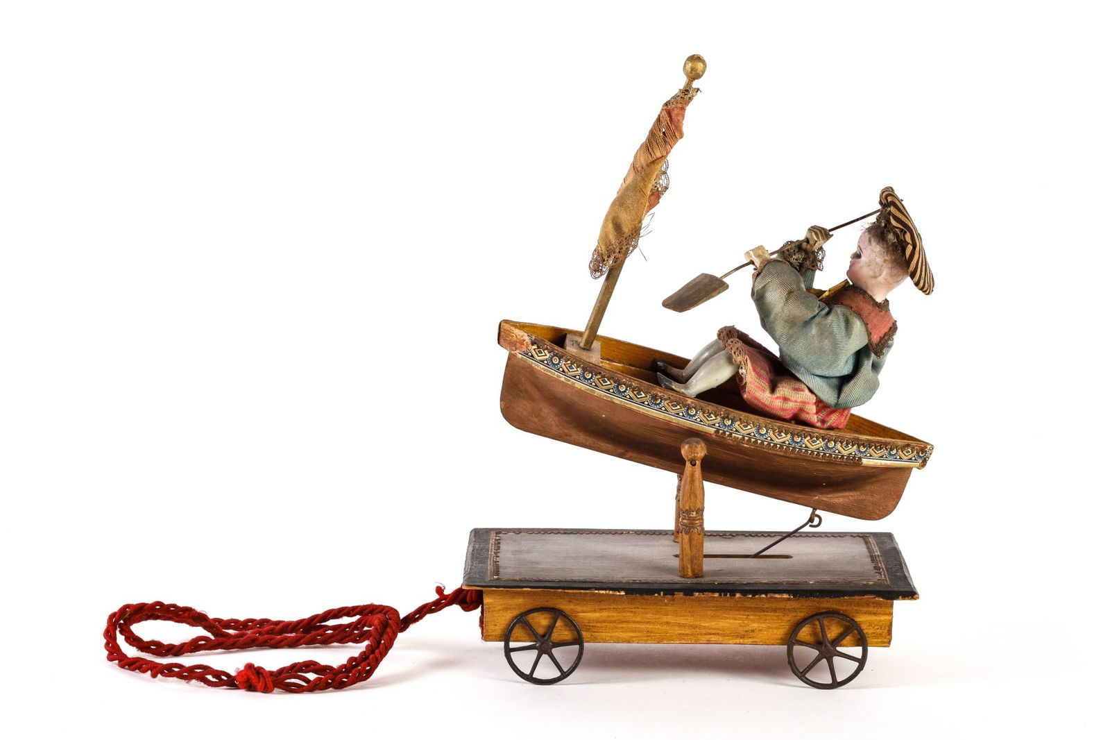 MECHANICAL PULL TOY: BOY IN BOAT (1 of 18)