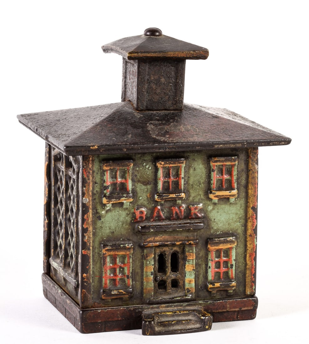 CAST IRON "BANK" BUILDING: Still bank in original, old paint, 5 inches high.