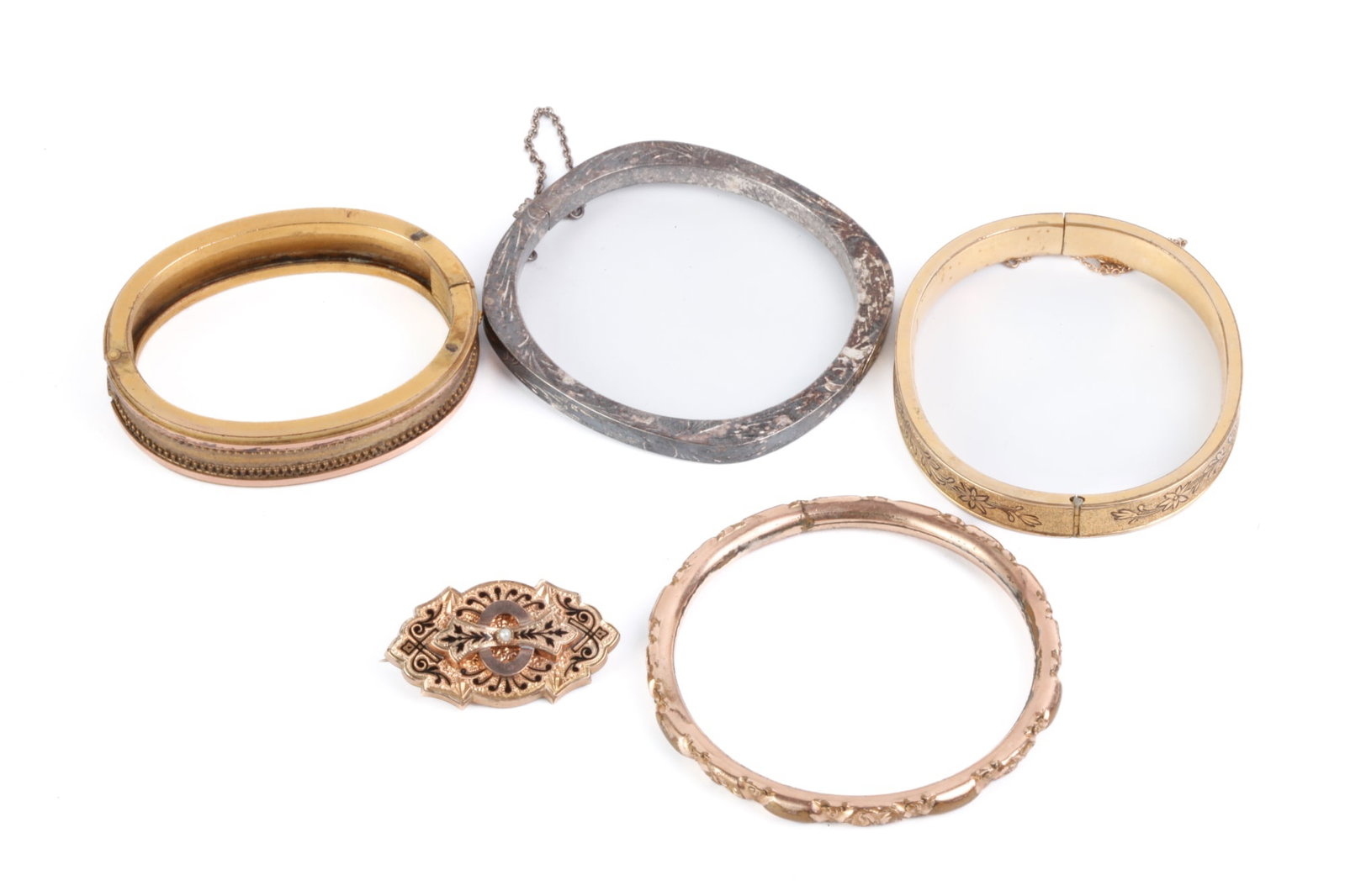 (4) VICTORIAN GOLD PLATED BANGLES & BROOCH: Together with a unmarked silver example. Each approx 2 1/2 x 2 inches
