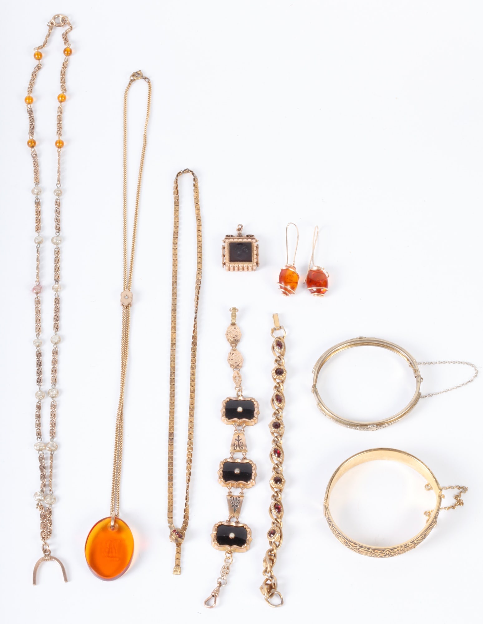 VICTORIAN JEWELRY UNDER 10k GOLD &/or GOLD FILLED: Including: Intaglio locket, enameled bangles, earrings, and an assortment of necklaces and bracelets.