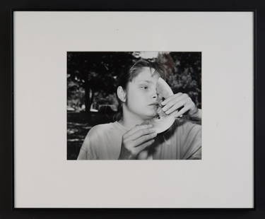 NICHOLAS NIXON (b. 1948): "Girl with Watermelon" (probably from Perkins School for the Blind gelatin silver print. 9 1/2 x 7 1/2 inches. framed 17 x 14 inches.