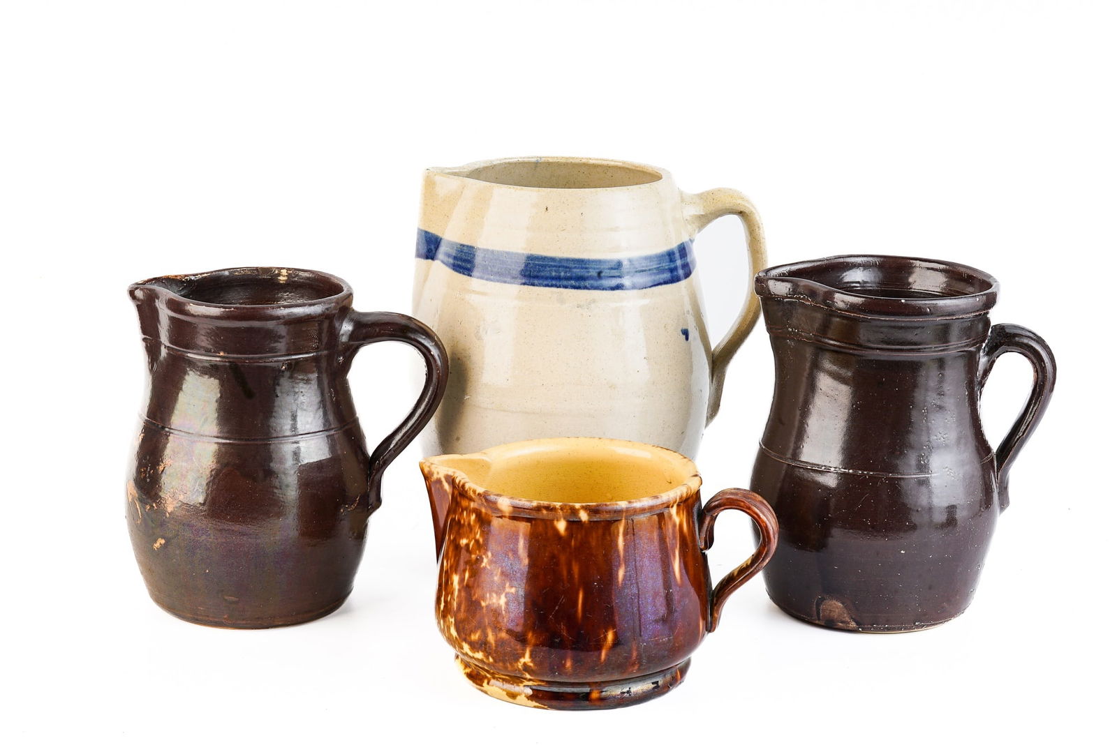 (4) STONEWARE and YELLOWARE PITCHERS (1 of 8)