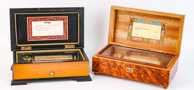 (2) SWISS REUGE & THORENS MUSIC BOXES: Burl Wood plays "Dr. Zhivago" and Torens plays Blue Danube 3 1/4 x 9 1/4 x 5 inches and smaller