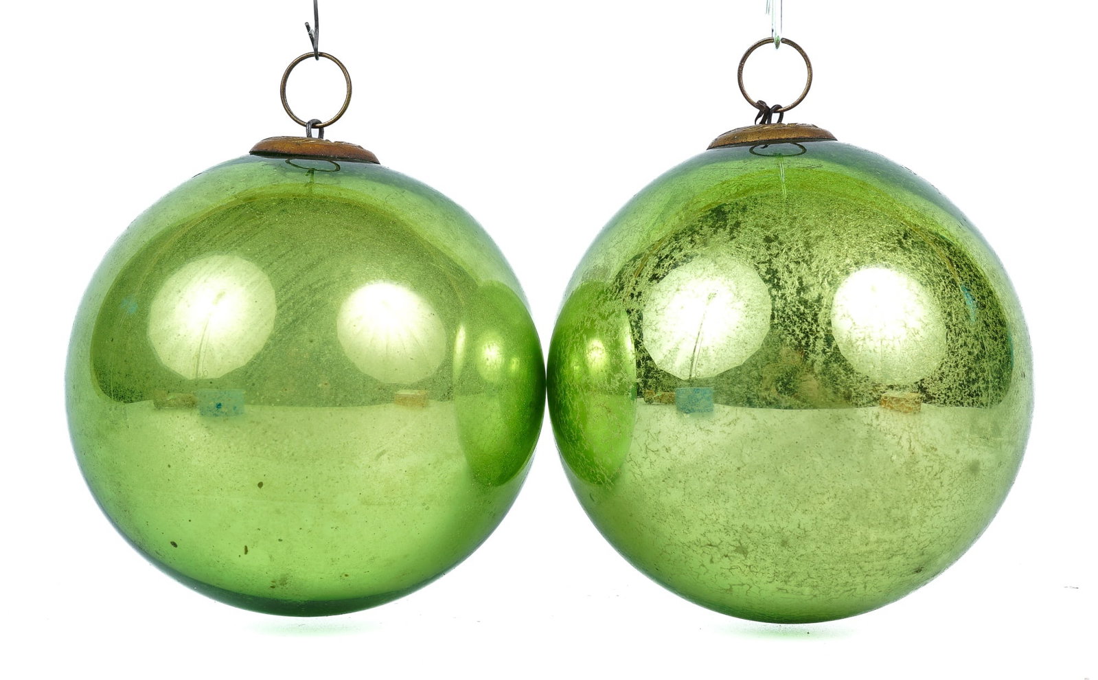 (2) MERCURY GLASS CHRISTMAS / KUGAL BALL ORNAMENTS: Each with a thick quality, embossed escutcheons and hanging rings. 4 inches