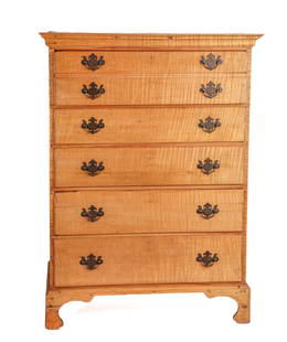 (19th c) N.H. TIGER MAPLE CHEST of DRAWERS: Solid tiger maple drawers with graining running the entire length of the chest. Molded double top drawer over graduating examples raised on shaped applied apron and bracket feet. 53 1/4 x 39 1/4