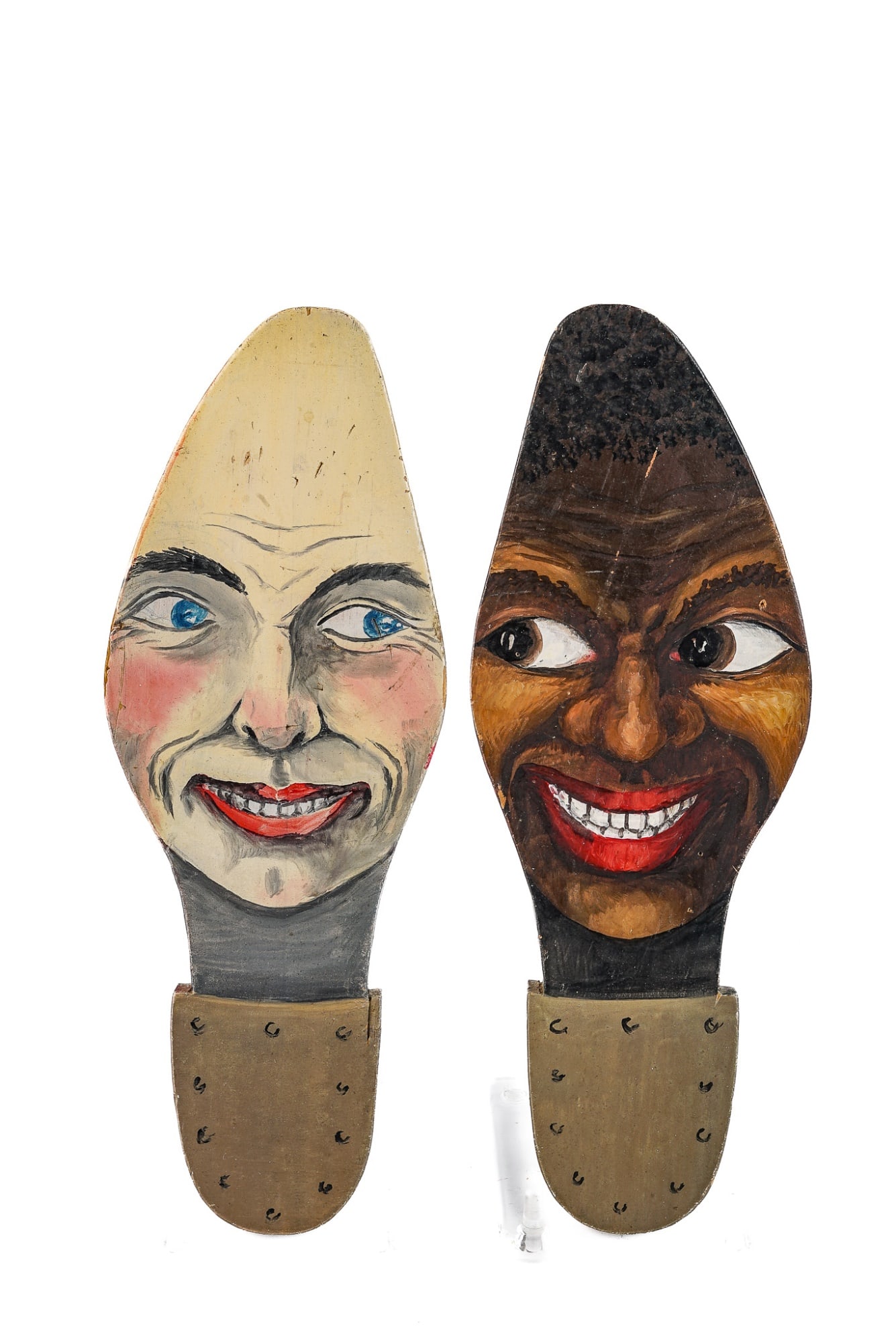 (Early-Mid 20th c) BLACK AMERICANA: Carved wooden shoe soles painted with black and white faces. 10 1/4 x 3 3/4 x 3/4 inches