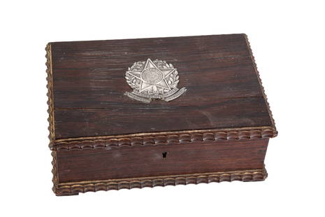 ROSEWOOD "ESTADOS UNIDOS DO BRAZIL" JEWELRY BOX: Dutch ripple molded box with silver Brazilian Coat of Arms mounted to a hinged lid which opens to a velvet-lined interior with pull out tray. 2 1/4 x 7 1/2 x 5 inches.