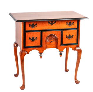 TIGER MAPLE LOW BOY by DAVID LeFORT of HANOVER MA: Solid bench made lowboy with molded top and drawer fronts highlighted with contrasting ebony paint. Lower drawer is fan-carved over a shaped apron with acorn drops, cabriole legs and pad feet. 30 1/2