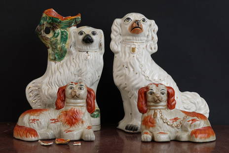 (4) STAFFORDSHIRE FIGURINES: Including: Cocker Spaniel figure, Cocker Spaniel with vase and a pair of contemporary examples. 13 inches (and under). Provenance: Knox Mansion / Orchard House 800 Delaware Ave Buffalo, NY by direct d