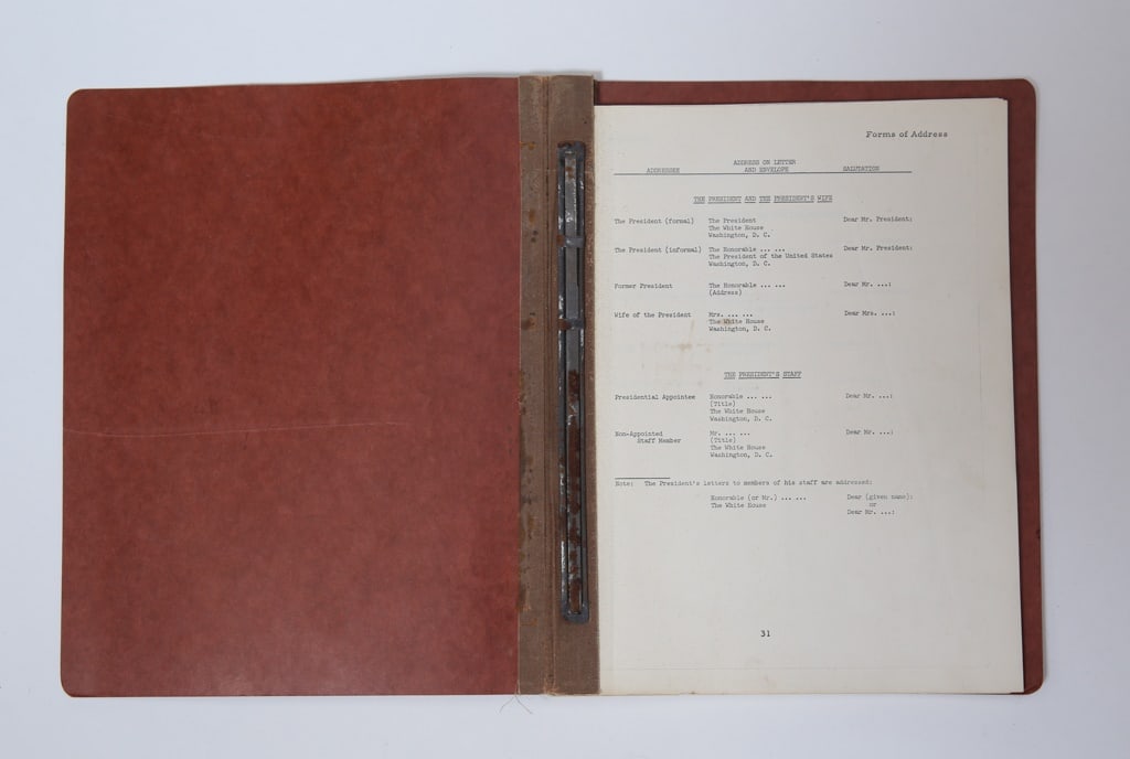 J.F.K.FORMS of ADDRESS: (41) page binder outlining forms of address to various constituents/ government officials. 11 1/2 x 9 1/4 inches. Provenance: Helen Mary Keyes, who worked many roles for John F. Kennedy, Jackie Kenned