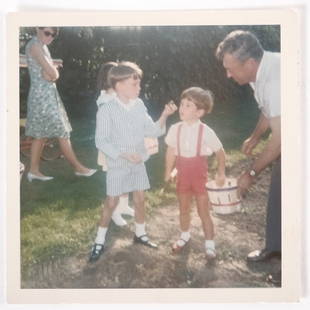 JOHN F. KENNEDY, Jr. with COUSIN CECIL in 1964: "Miss Alice Brayton's Green Animals" (topiary) Newport, RI. Unpublished color photograph 3 1/2 x 3 1/2 inches Provenance: Yusha Auchincloss archive from The Castle at Hammersmith Farm.