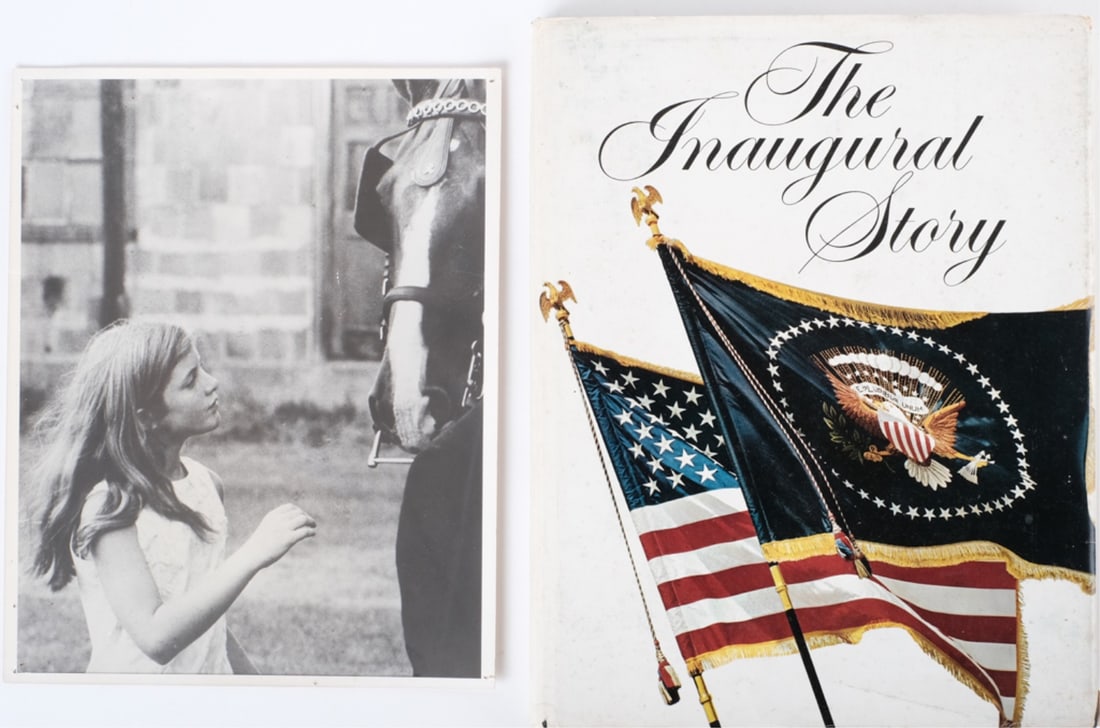CAROLINE KENNEDY with HORSE c. 1969: 8 x 10 inch black and white photograph, together with "The Inaugural Story 1789-1969" by American Heritage Magazine. 1969. hardcover paperbound Provenance: Yusha Auchincloss archive from The Castle at