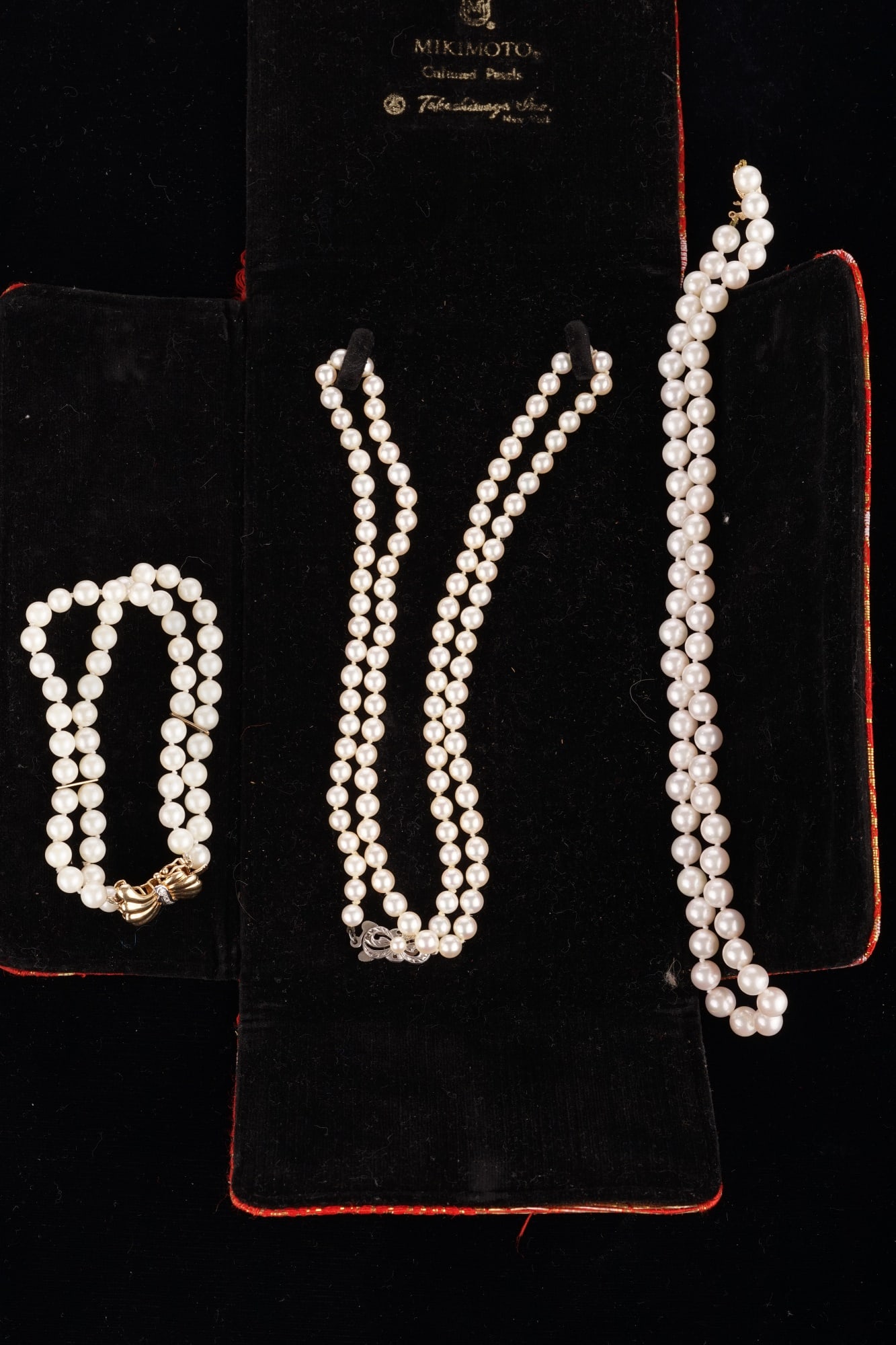 14k GOLD & PEARL NECKLACE and BRACELET & (1) OTHER: Pearl necklace with 14k gold clasp marked "W", pearl bracelet with 14k gold butterfly form clasp set with petite diamonds marked "CH" and a Mikimoto Japanese cultured pearl necklace with silver clasp