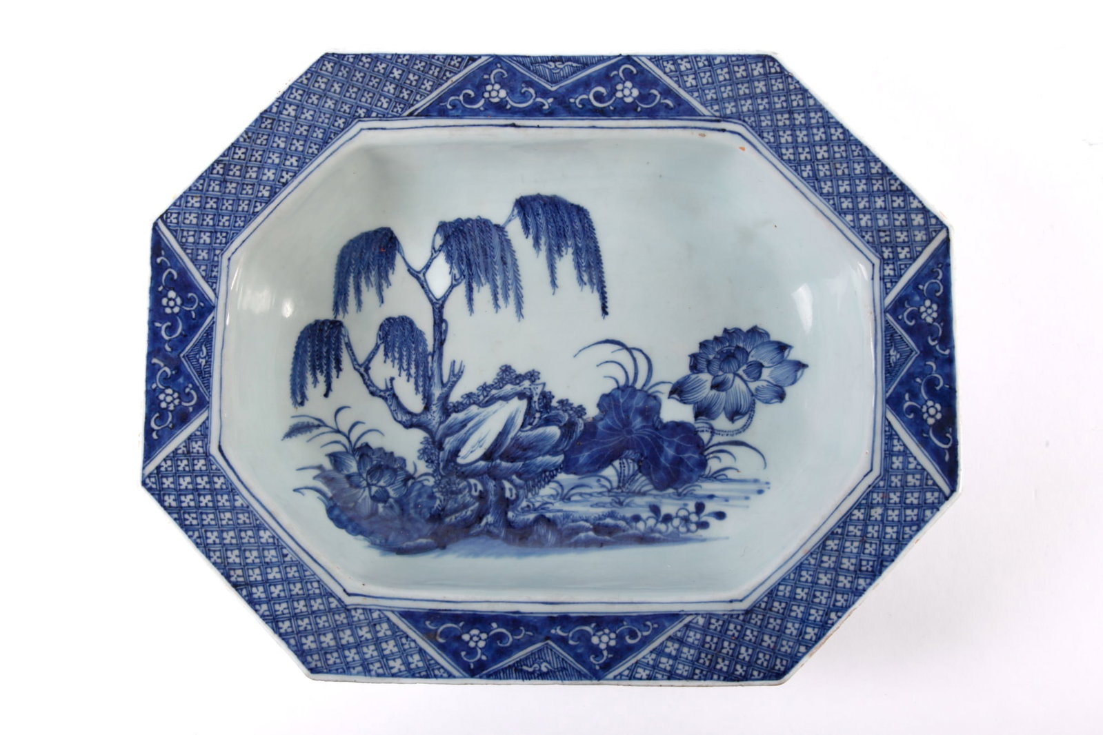 CHINESE BLUE AND WHITE PORCELAIN DEEP PLATTER: 18th c. Painted with landscape with blossoming lotus. 14" long