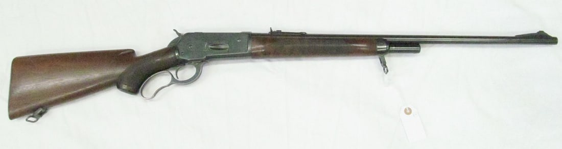 WINCHESTER MODEL 64 DELUXE 32 SPL RIFLE: sn 1995792, Checkered forearm, walnut stock, skeleton butt plate. Front of trigger to end of stock is 13 ¼”. Factory-fitted for carrion straps