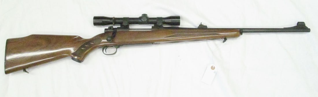 WINCHESTER MODEL 70 225 RIFLE: sn 717268, Deluxe, bolt action, with All American 4X scope, factory carrion