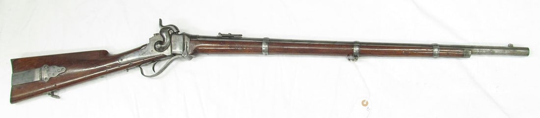 SHARPS NEW MODEL 1863 MILITARY RIFLE 52: sn C34679, 30" round barrel with pinned blade front sight, Lawrence patent graduated leaf rear sight. Walnut forearm & straight grip stock with original sling swivels. Bbl. 28 ¾?, O.H. 47?&