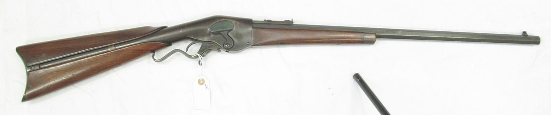 EVANS REPEATING RIFLE SPORTING LEVER ACTION RIFLE: sn 77, 25 1/2" octagon barrel with bead front sight & graduated leaf rear sight. Top flat is marked EVANS REPEATING RIFLE MECHANIC FALLS, ME/PAT DEC. 8, 1868 & SEPT. 16, 1871. Early model. Bbl. 25R