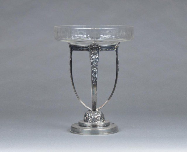 Cut glass compote: Cut glass compote on a floral decorated silver plated stand. H: 12 3/8" D: 9 1/8"