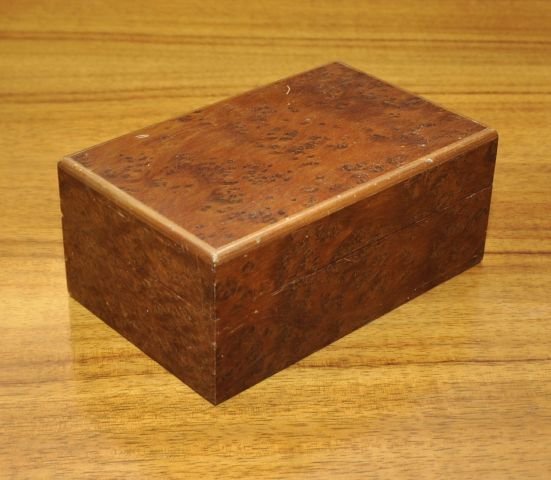 Dunhill burl wood humidor: Dunhill burl wood humidor. H: 3 1/2" W: 8 3/8" D: 5 1/8"