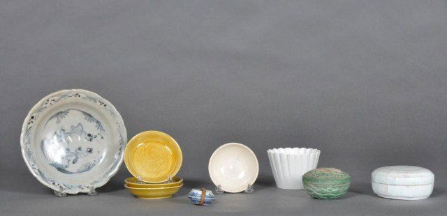 Group of Asian porcelains including three yellow m: Group of Asian porcelains including three yellow monochrome saucers, early Chinese blue and white dish, small Chinese tea bowl, etc. Diameter of largest: 7"