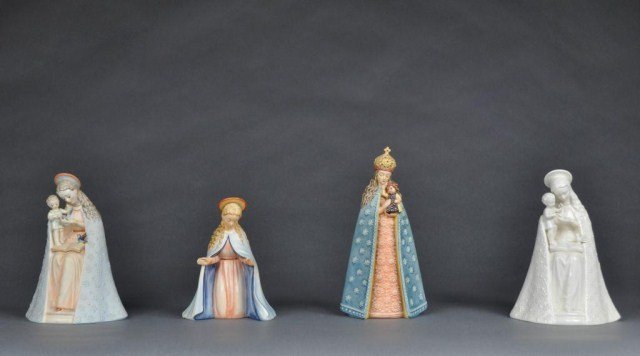 Group of four Hummel figures consisting of two Flo: Group of four Hummel figures consisting of two Flower Madonnas, Supreme Protection and Nativity Virgin. Tallest: 9 1/4"