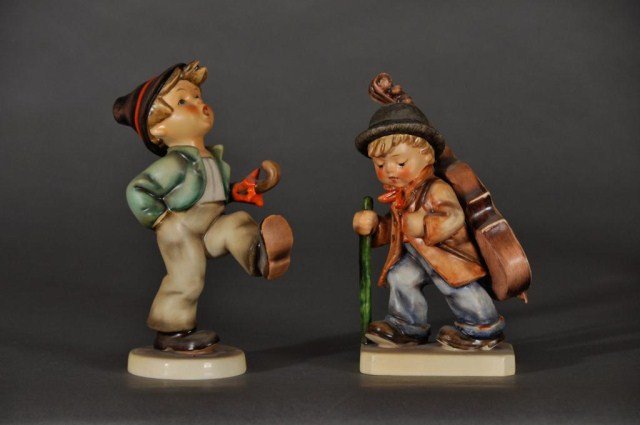 Two Hummel figures consisting of "Happy Traveler" : Two Hummel figures consisting of "Happy Traveler" TMK-3 and "Little Cellist" TMK-5, tallest 7 3/4"