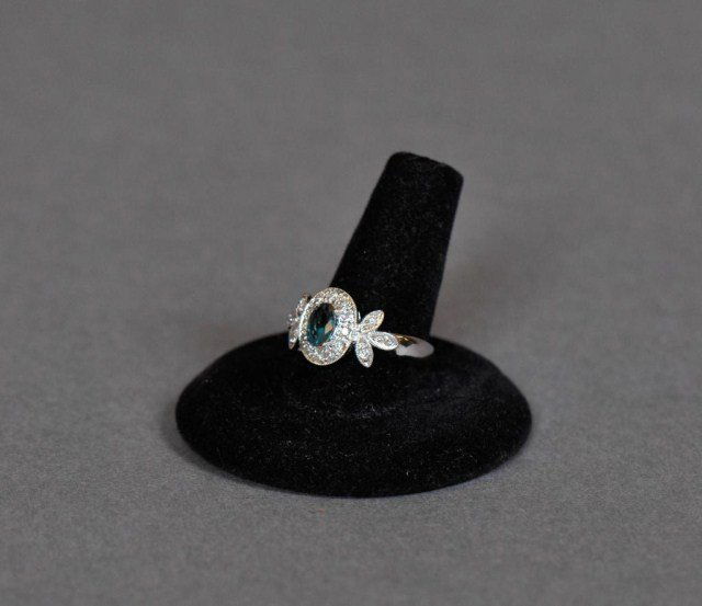 14k White Gold diamond and Alexandrite ring: 14k White Gold diamond mount set with approximately .50 ct color changing Alexandrite, purple to green, size 7.5, DWT 2.1