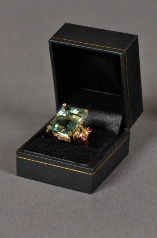 14k Gold ring with green beryl & red stones: 14k Gold mount set with large light green beryl color rectangular stone and four small red stones, size 7.25, DWT 10