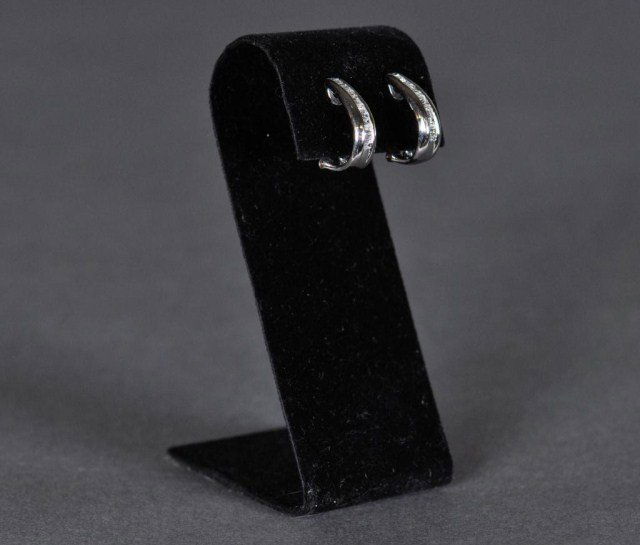 14k White gold channel set diamond hoop earrings: 14k White gold channel set emerald cut diamond hoop earrings, approx. 19 mm x 5.5 mm, DWT 3.5