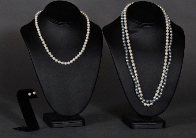 Lot of pearl jewelry, 4 pieces total. Strands etc.: Lot of pearl jewelry, two 24" strands 1 gray, 1 white with gold clasps, 7 to 7.5mm, one 17" strand with gold clasp and matching earrings, 6.5 to 7 mm