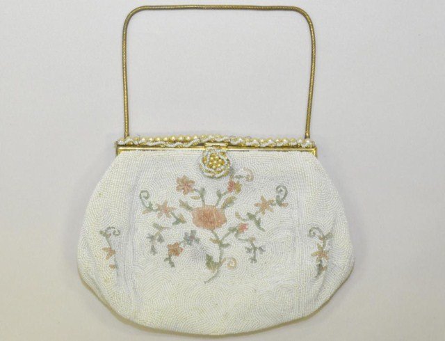 Lot of three evening purses, one French: Lot of three evening purses, French white beaded with pink floral design, 7 3/4" x 5 1/2", two mesh Whiting & Davis, one in gold tone, 8" x 5" the other silver tone 6" x 7"
