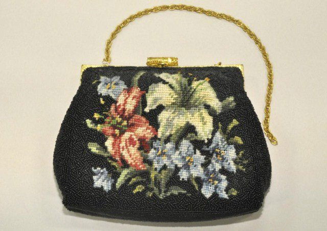 Lot of four antique purses: Lot of four antique purses, one black velvet with jet beads, two floral beaded on frames, one floral embroidery on black ground