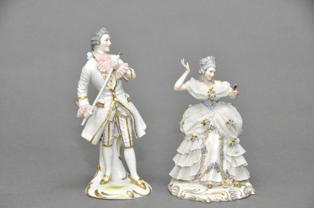 Lot of two antique Dresden style porcelain figures: Lot of two antique Dresden style porcelain figures in fancy dress. Man marked Anton Muller, Volkstedt. Woman mark unknown. Tallest: 8 5/8"