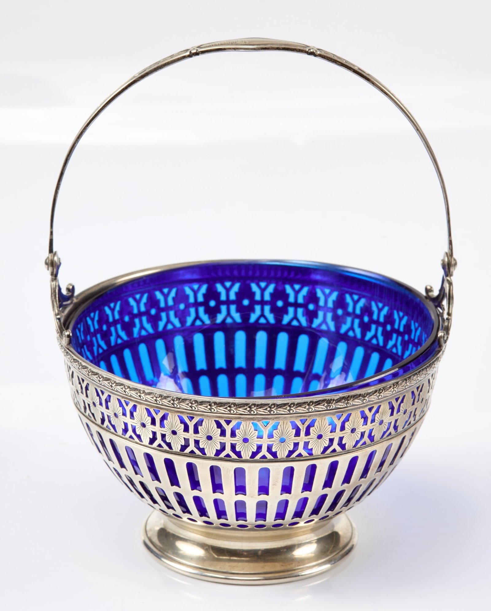 WATSON COMPANY STERLING BASKET with COBALT INSERT: 6 1/2 x 4 1/2 inches (including extended swing handle). 3.8 troy ounces (without insert)