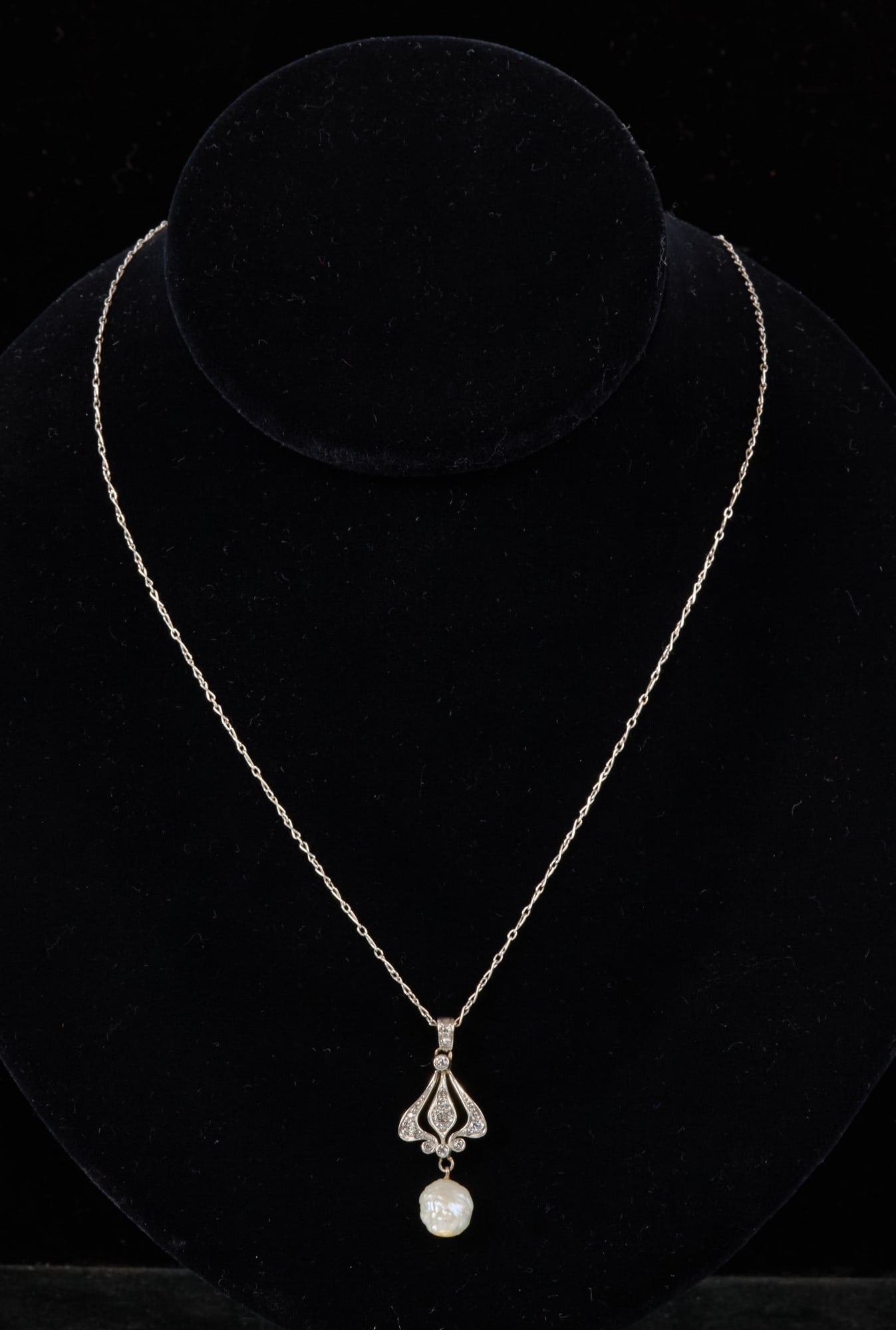 14k WHITE GOLD and DIAMOND & PEARL PENDANT: White gold pendant backed with yellow gold. 1 1/4 inches with 16 inch chain 3.30 dwt. Provenance: Louise Landry who's husband was an attach? to Rome.