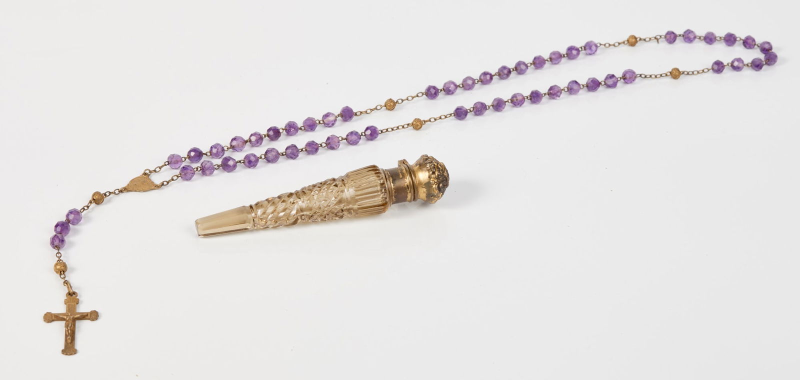 AMETHYST ROSARY BLESSED BY POPE & HOLY WATER VILE: 22 inch chain. Vile with sterling cap is set with faceted amethyst. 4 inches. Provenance: Emerson family / Aunt Louise Landis who's husband was an attache to Rome.