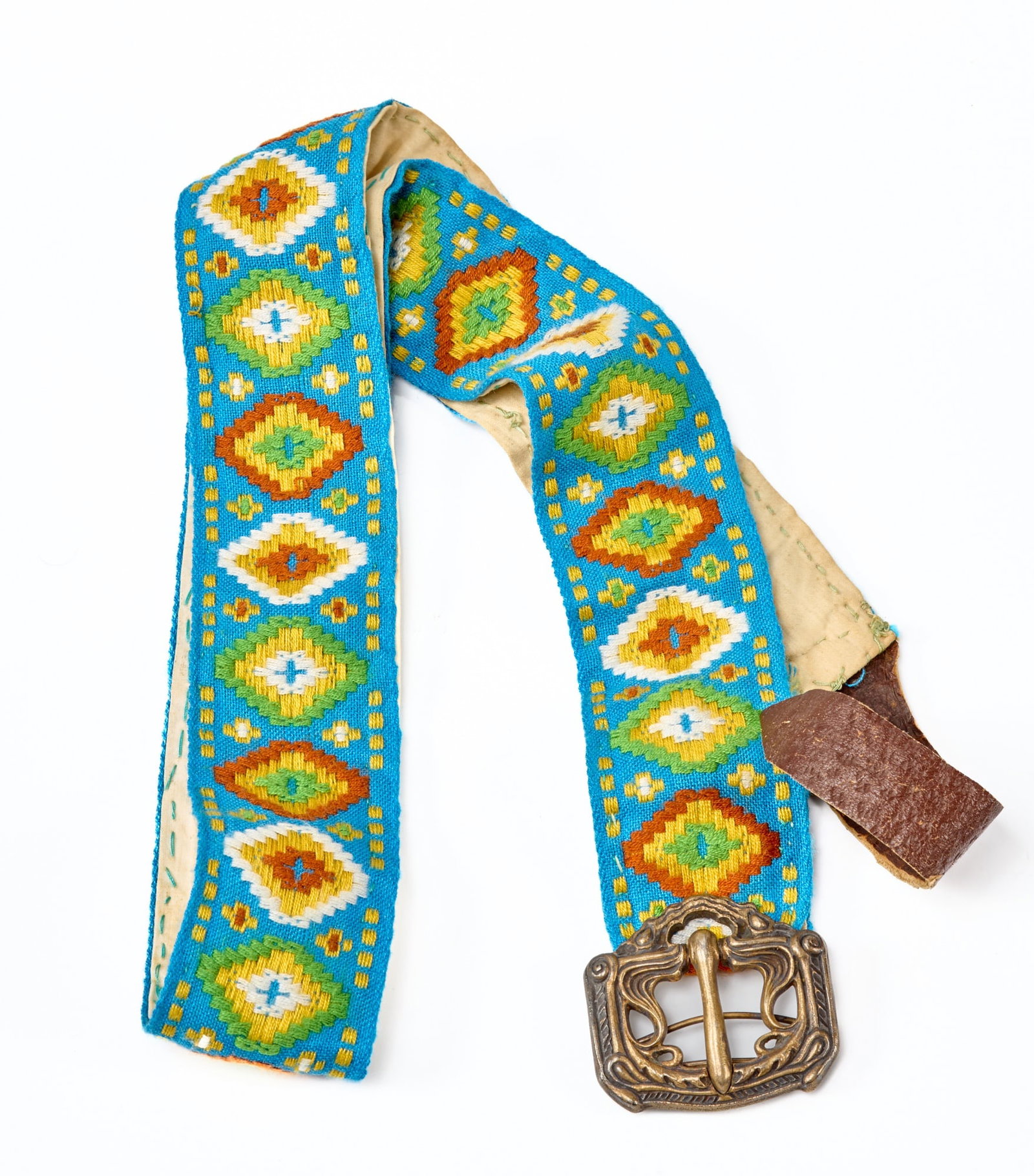 EMBROIDERED WOOL BELT with STERLING BUCKLE: Buckle signed M.G ?. sterling 49 weighs approx. 1 troy ounce. 41 inches (overall).