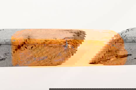 RICHARD ROTHBARD BURL MAPLE "PUZZLE BOX": Jig sawed box with crescent moon slides opens to a fitted velvet-lined interior especially for jewelry. signed. 2 1/2 x 8 1/2 x 2 3/4 inches. N.B. Richard Rothbard is a contemporary American Craftsman