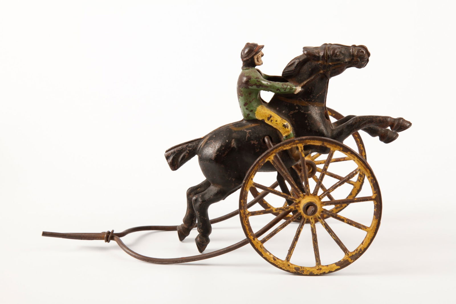 WILKINS CAST IRON "GALLOPING JOCKEY" PUSH TOY (1 of 12)
