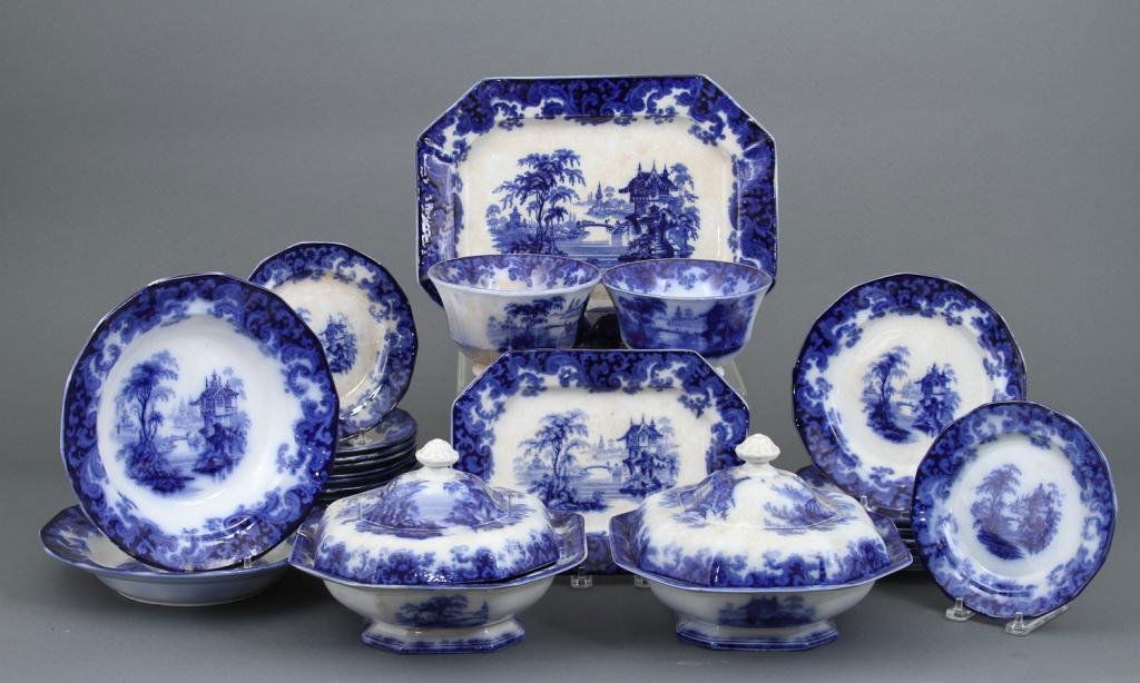 Lot of Flow Blue: Approximiately 26 pieces of (19th c.) Flow Blue, some marked Columbia included 2 covered casseroles, 2 platters, 10 5/8" and 13 3/4", 2 bowls, 6 1/4", 2 low bowls, 10 3/8", 6 plates, 8 3/4" and 12 pla