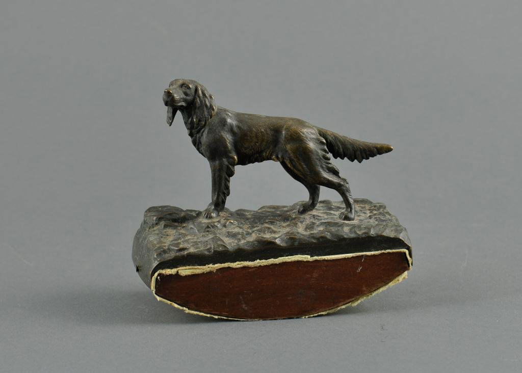 A (19th c.) Bronze Dog Ink Blotter: Dark patina, on wood base marked within a diamond "Klar" and signed F. Klar under base,.European School Condition: good Size: 6 1/2" x 6"good6 1/2" x 6"