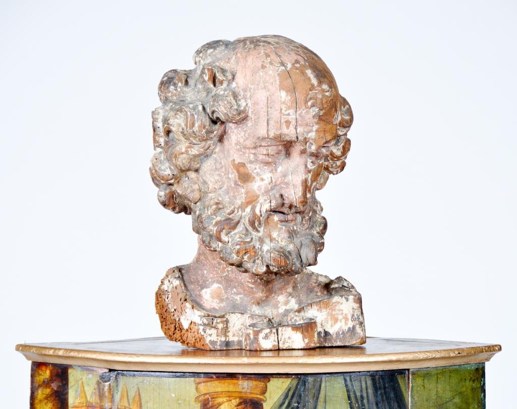 Old Master School (17th/18th c.): Early Continental (probably Italian) wood carving of Joseph (head, neck and collar). Condition: shrinkage cracks, most of the paint decoration stripped to wood, insect damage Size: 13 1/2" x 8 1/2" x 