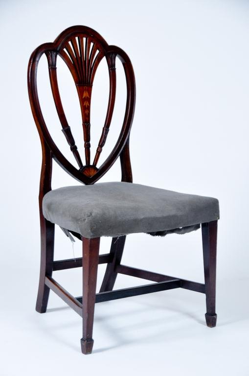 (18th c.) Massachusetts Hepplewhite Side Chair: Mahogany carved shield back chair with belle flower inlaid splat and spade feet. Condition: Very good condition Size: 38" x 20" x 18"good38" x 20" x 18"