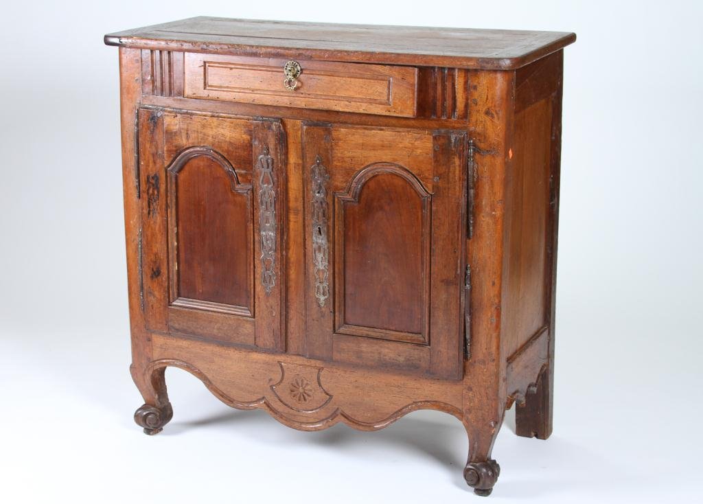 (19th c.) Provincial Server: Rectangular server with molded drawer and brass pull above two arched molded cabinet doors having offset iron hinges. Scrolled ogee feet. Condition: good Size: 37 1/2" x 38" x 18"good37 1/2" x 38" x 1