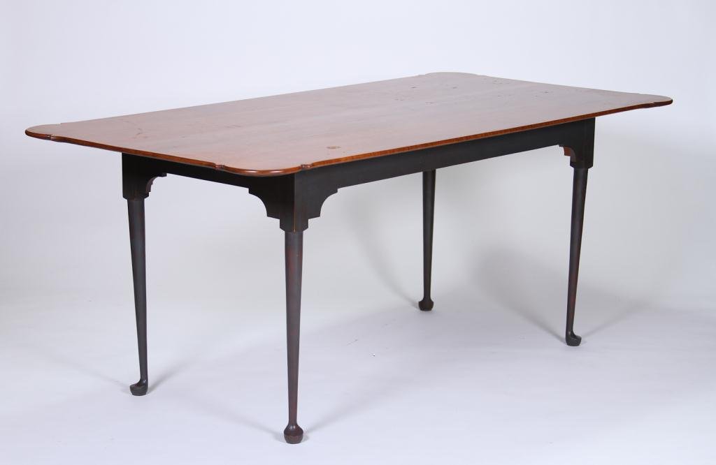 Eldred Wheeler Tiger Maple Table: Custom made porringer-top tiger maple table with blue painted base, turned legs and duck feet. Eldred Wheeler paper label and brand beneath top. Condition: good, abrasions to top Size: 72" x 36" 29 1/