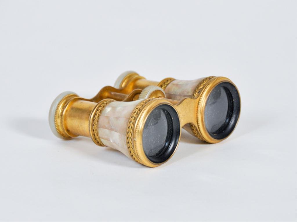 Mother of Pearl Opera Glasses: Le Maire, Paris mother of pearl opera glasses with foliate bands Condition: good Size: 4" at basegood4" at base