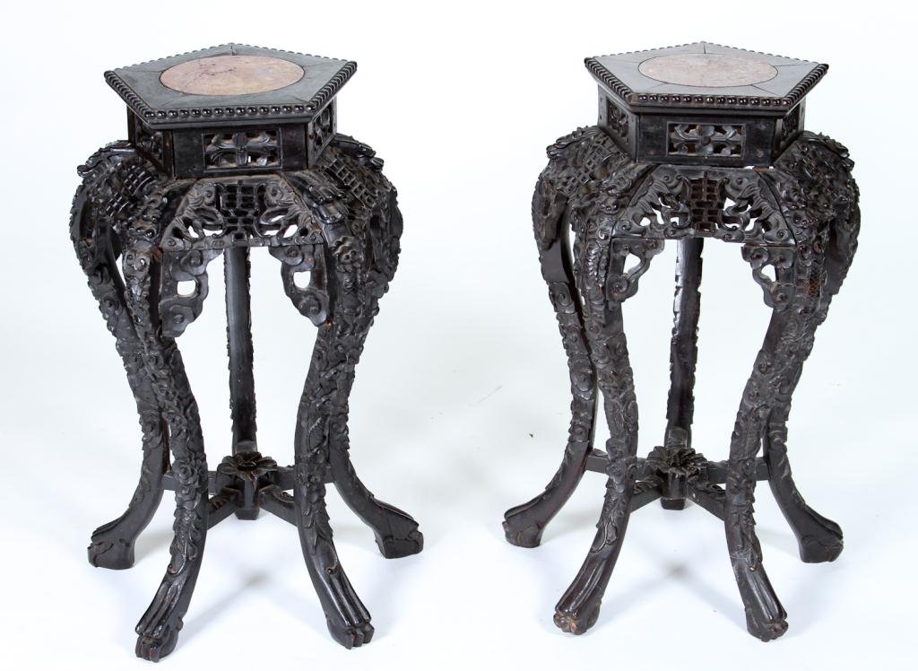 Pair of Asian Stands: (19th c.) five sided teak wood elaborately carved stands with mable inset Condition: good Size: 27" x 14" x 14"good27" x 14" x 14"