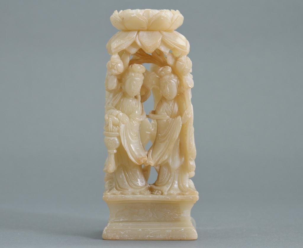 Asian Soapstone Carving: Two geisha under a lotus blossom Condition: good with minor roughness Size: 8 1/4" h.good with minor roughness8 1/4" h.